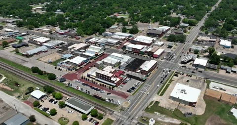 High pull back flight with an over view of the small town Stock-Footage 335673190