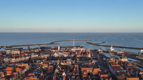 High pullback revealing full harbor city and North Sea Video stock 334097786