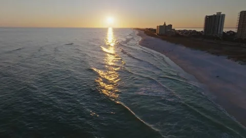 High push in aerial drone shot of sunset on Pensacola beach at sunset waves Stock Footage 302192198
