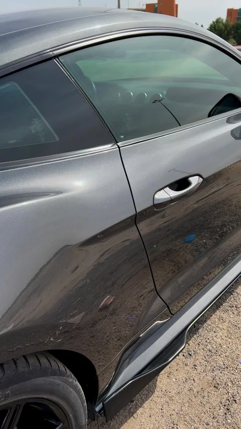 High-Quality 4K Vertical Video of a Stylish Dark Car. Stock-Footage 303009392