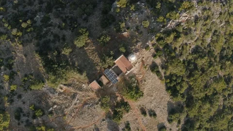 High quality aerial video footage of lighthouse in the middle of wild woods. Stock Footage