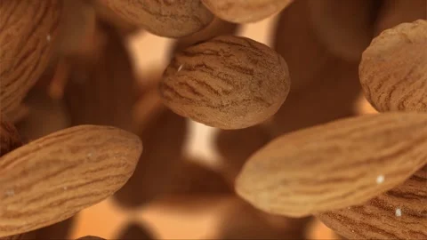 High-Quality Almonds Falling Slowly, Cinematic Close-Up Video stock 282728244
