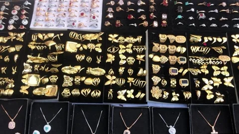 High-Quality Artificial Jewelry Display at Market Stall | Fashion Rings  Stock Footage 345079799