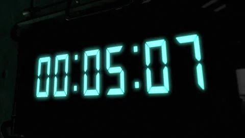 High quality CGI render of a digital countdown timer on a wall-mounted Stock Footage 248429111