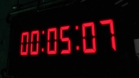 High quality CGI render of a digital countdown timer on a wall-mounted Stock Footage 248429733