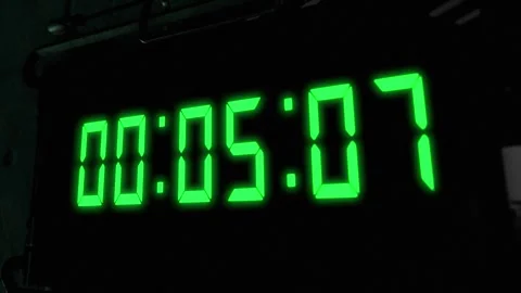 High quality CGI render of a digital countdown timer on a wall-mounted Stock Footage 248429750