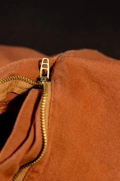 A high-quality close-up of the zipper on a pair of blue jeans with black Stock-Fotos