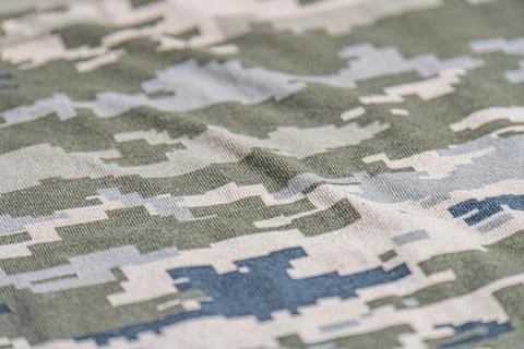 This high-quality image showcases a seamless camouflage pattern inspired by.. Stock Photos