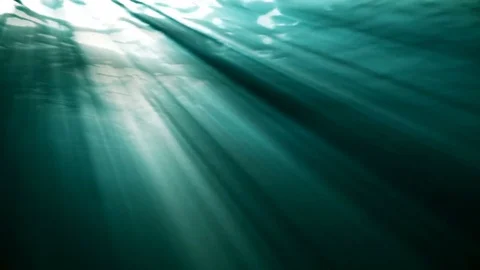 High quality Looping animation of ocean waves from realistic underwater. Light Stock Footage 77251270
