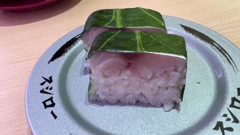 High Quality Mackerel Sushi Wrap in Leaf Close Up Shot 4K Stock Footage 228710066