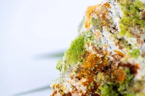 A high-quality macro photograph featuring natural yellow pyromorphite crystal Stock Photos