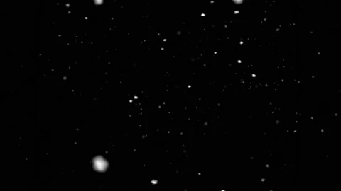 High quality motion animation repesenting snow slow falling on black Video stock 143313286