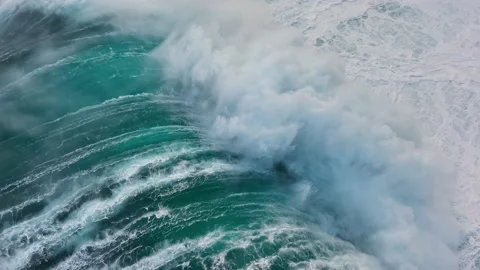 High quality qerial slow motion shot of sea or ocean surf with white foam. Huge Stock Footage 169694623