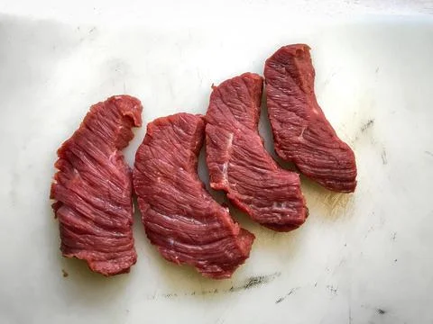 High-quality raw beef on plain white Stock Photos