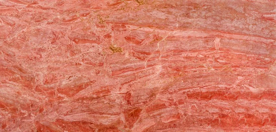 High-quality red marble surface featuring intricate golden patterns, perfe... Stock Photos