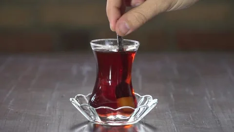 High Quality slow motion in a Cup of Turkish tea Stock Footage 132428463