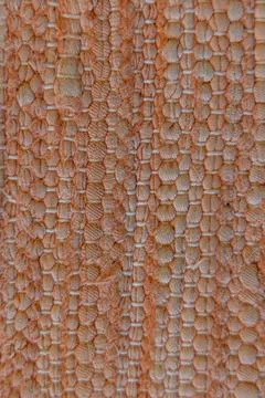 High quality texture of a coarse light orange fabric. Foto stock