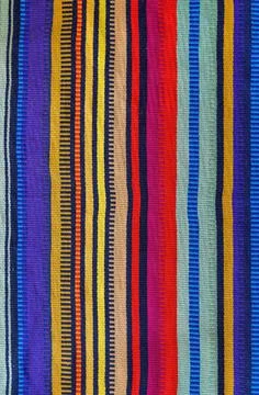 High quality texture of a multicolor vertical striped fabric in Mexican style. Foto stock