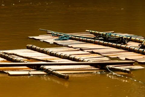High quality timber transported downstream via the river,ensuring efficient and Foto stock