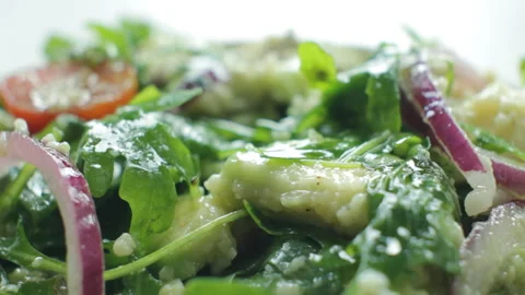 High quality video of eating with a fork fresh vegetarian avocado salad wit.. Stock Footage 233454935
