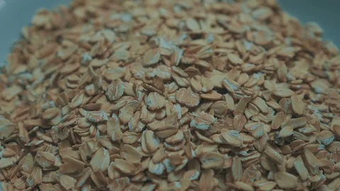 High quality video of falling oatmeal in real 1080p slow motion Stock Footage 93216969