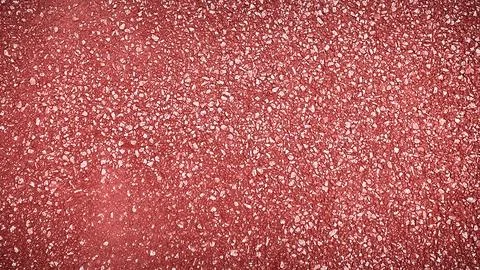 High-resolution 4K texture of light red asphalt road surface with small sto.. Illustrazione stock