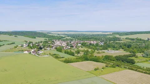 A high-resolution aerial drone shot showcasing the picturesque rural village of Stock Footage 346687489