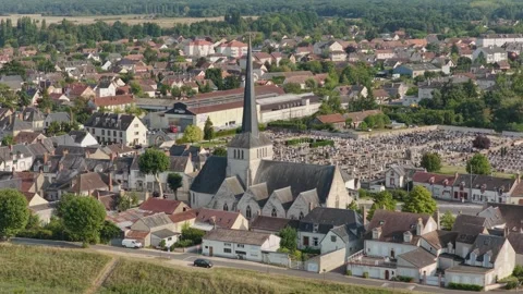 High-resolution aerial footage showcasing the historic church with a tall spire Stock Footage 346714562