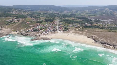 A high-resolution aerial shot showcasing the coastline of Praia de Baldaio in Stock Footage 346710771