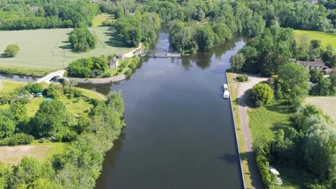 A high-resolution aerial video captures the tranquil Cure River as it winds Stock Footage 346677174