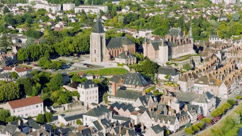 A high-resolution aerial video captures the picturesque town center of Gien Stock Footage 346686892