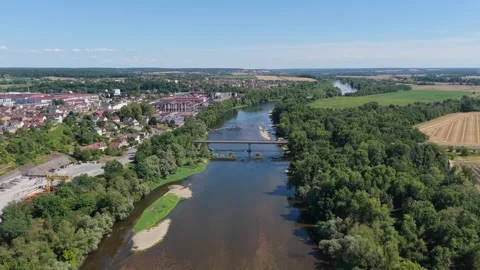 A high-resolution aerial video captures the scenic landscape of Imphy, France Stock Footage 346721721