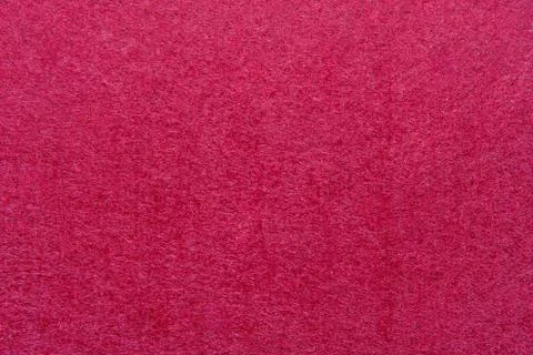 High resolution close up of bright raspberry felt fabric texture of rough fleecy 스톡 사진