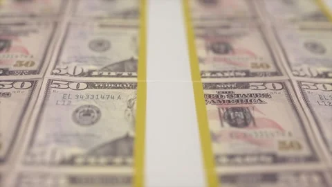 High-Resolution Close-Up of Fifty Dollar Bills in Printing Process Stock Footage 328097044