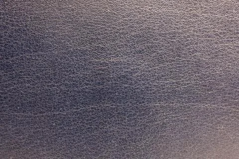 High-resolution close-up texture of dark leather material. Foto stock