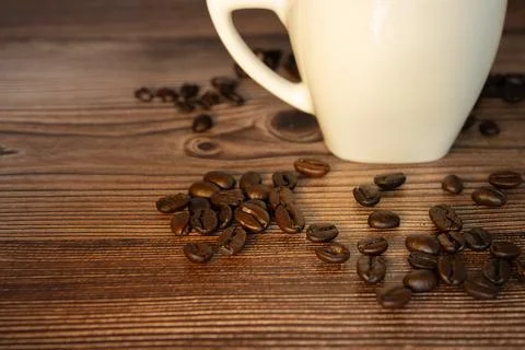 High resolution of coffee grains on a table Stock Photos