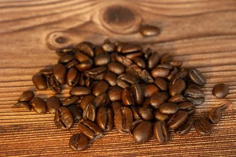 High resolution of coffee grains on a table Stock Photos