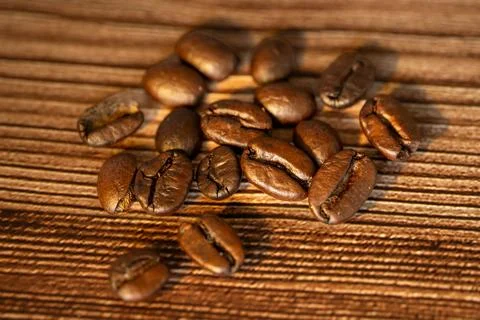 High resolution of coffee grains on a table Stock Photos