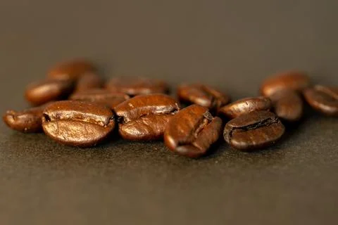 High resolution of coffee grains on a table Stock Photos
