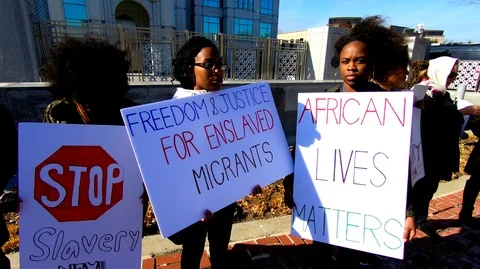 High resolution footage of protests against Libyan slavery  Stock Footage 85530217