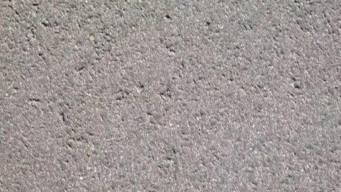 High-resolution image capturing the detailed surface of an asphalt road Stock Footage 269960165