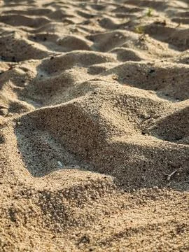 High resolution image of fine beach sand with subtle natural grain texture .. Stock Photos