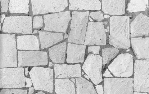 A high-resolution image of a seamless textured stone wall Stock Photos