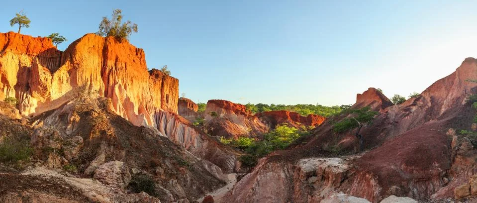 High resolution panorama of Marafa (Hell's Kitchen) stone cliffs during red a Stock Photos