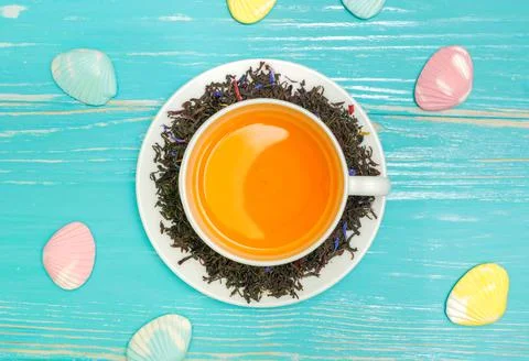 High resolution photo: Cup with tea , around brew and sweet-stuff Stock Photos