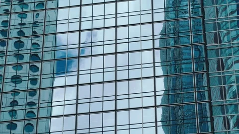 A high-resolution shot of a modern multi-story building in the Central district Stock Footage 338165263