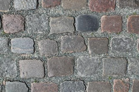 A high resolution texture of cobblestone historical roads with square and rec 스톡 사진
