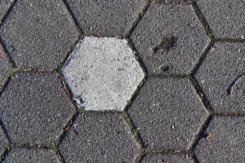 A high resolution texture of cobblestone historical roads with interlocking r Stock Photos