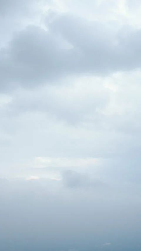 A high-resolution vertical drone timelapse showcasing dynamic cloud Stock Footage 304250664