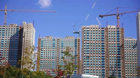 A high-rise apartment complex under construction Stock Footage 253760803